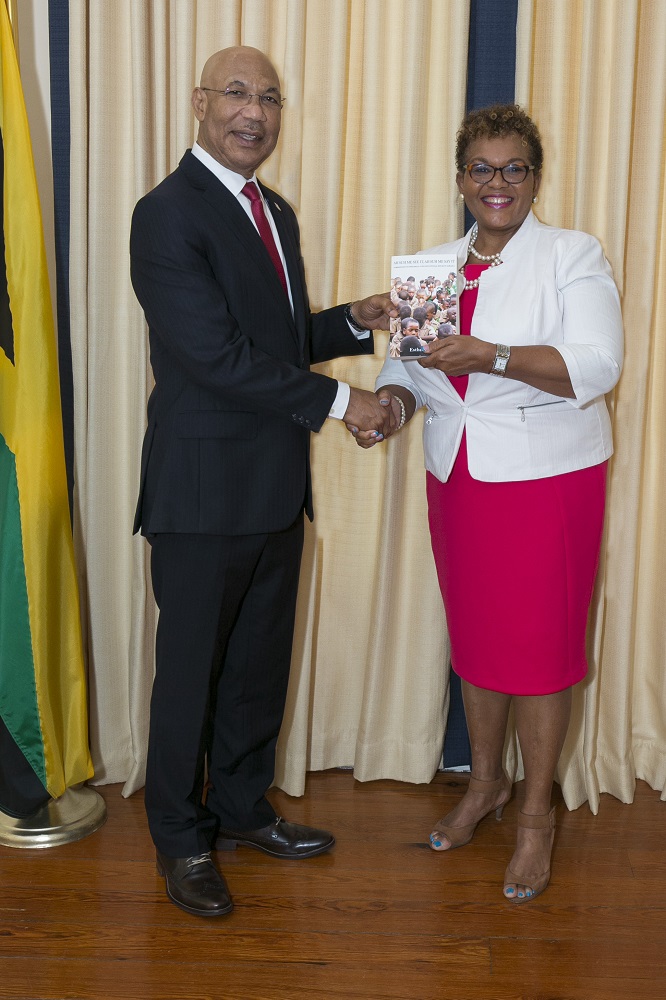 Esther Tyson with the Governor-General of Jamaica, Sir Patrick Linton Allen ON GCMG CD KStJ