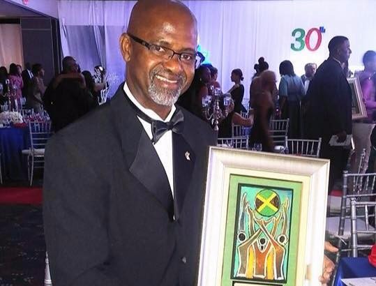 Jamaican Irwine Clare Receives AMCHAM Award