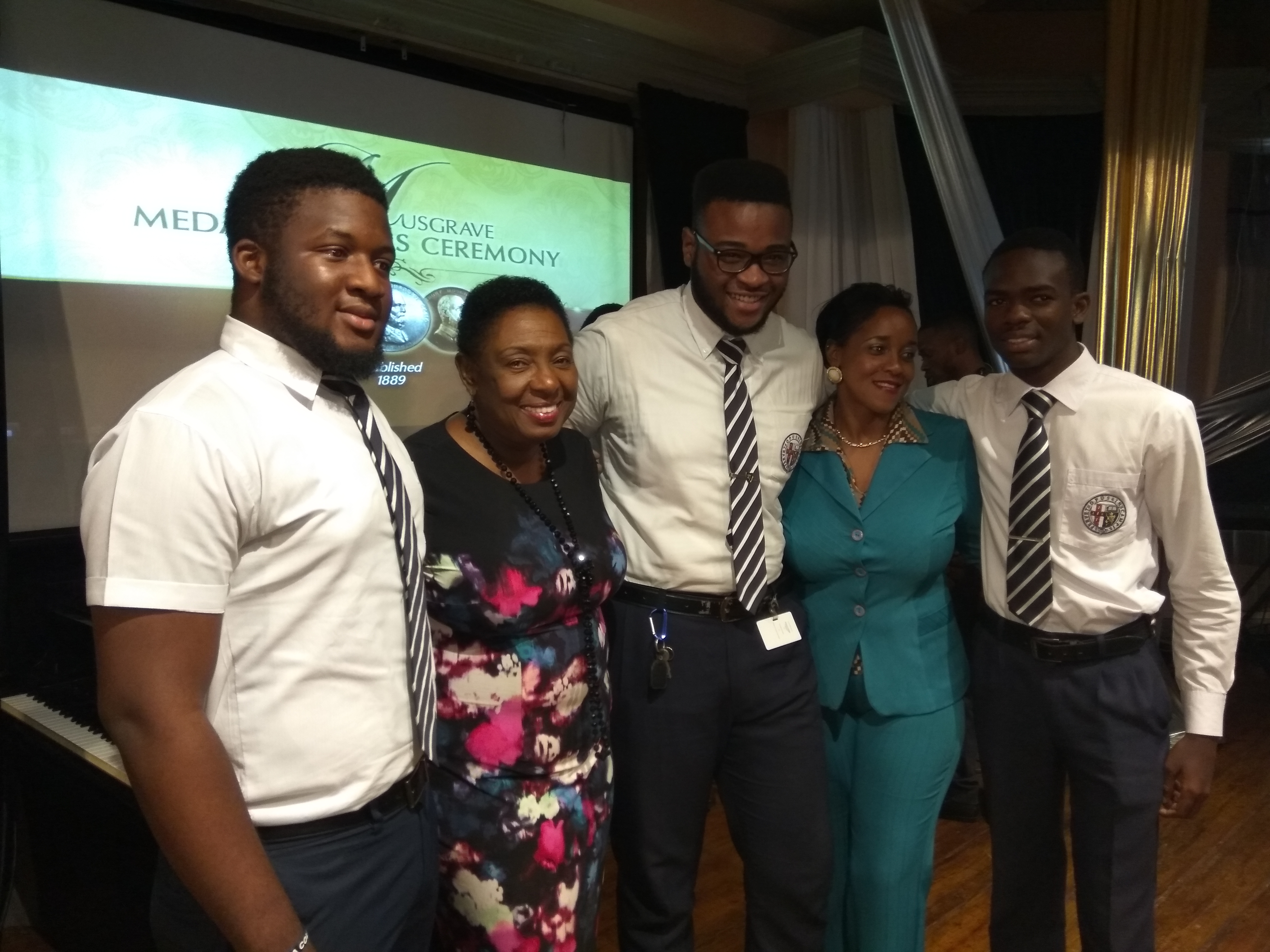 ANTHEA McGIBBON PHOTO: 2017 Musgrave Medals Awards Ceremony held at the Lecture Hall, Institute of Jamaica on May 25th, 2017. Representatives of Jamaica College share a photo with Hon Olivia Grange, DC, MP.