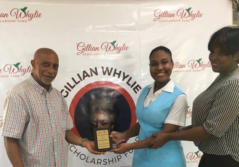 Tiana-Lee Gray and mother Natalie Lawrence receives award from Paul Whylie husband of Gillian Whylie - Gillian Whylie Scholarship Wolmer High School feature